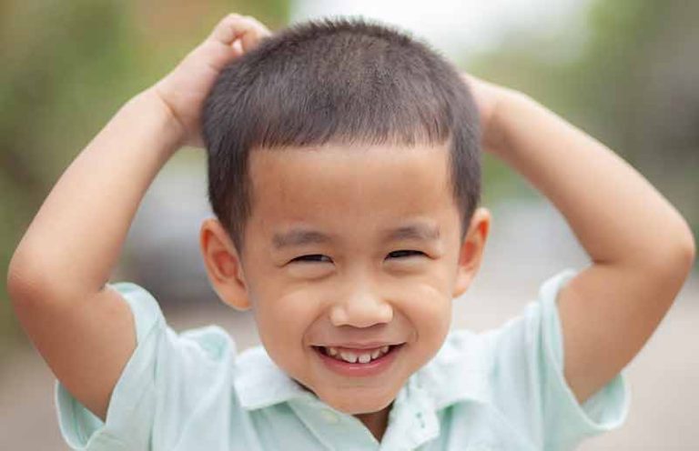 Boy Happy with Hands in Air