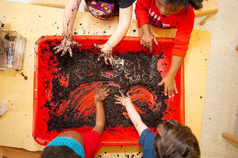 Children exploring direct in a small group